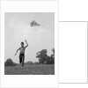 1960s Boy Running Flying Kite by Anonymous