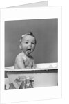1940s Wet Baby In Bath Covered With Soap Suds Sticking Out Tongue by Anonymous