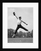1960s Boy Jumping In Outfield To Catch Baseball With Gove by Anonymous