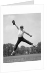 1960s Boy Jumping In Outfield To Catch Baseball With Gove by Anonymous