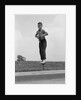 1960s Boy Jumping On Pogo Stick by Anonymous