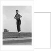 1960s Boy Jumping On Pogo Stick by Anonymous