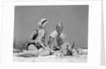 1970s 1960s Family Father Mother Twin Sons Playing In Sand On Beach Outdoor by Anonymous