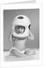 1960s Baby In Diaper Seated Holding Astronaut Helmet With Antennae On Head by Anonymous
