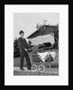 1960s Man Pushing Stroller Baby Carriage Suburban Sidewalk by Anonymous