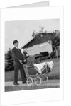 1960s Man Pushing Stroller Baby Carriage Suburban Sidewalk by Anonymous