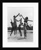 1960s Family Jumping Playing Beach Volleyball by Anonymous