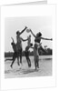 1960s Family Jumping Playing Beach Volleyball by Anonymous