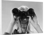 1960s Woman Looking Through Binoculars by Anonymous