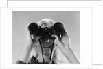 1960s Woman Looking Through Binoculars by Anonymous