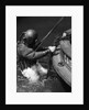 1930s Side View Of Diver In Pressure Suit Descending Into Water From Side Of Boat by Anonymous