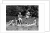 1930s Two Couples Having Summer Picnic With Food And Drink Spread Out On Blanket The Tip Of A Canoe Is Visible by Anonymous