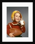 1950s 1960s Boy Drinking Glass Milk Wearing Football Helmet Shoulder Pads by Anonymous