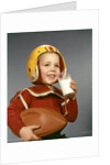 1950s 1960s Boy Drinking Glass Milk Wearing Football Helmet Shoulder Pads by Anonymous