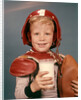 1960s Boy Wearing Red Helmet Football Shoulder Pads Holding Glass Milk and Football by Anonymous
