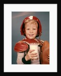 1960s Boy Wearing Red Helmet Football Shoulder Pads Holding Glass Milk and Football by Anonymous