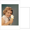 1950s 1960s Girl Eating Ice Cream Cone Double Scoop Vanilla by Anonymous