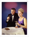 1960s 1970s Couple In Formal Tuxedo And Evening Dress Toasting With Champagne Glasses by Anonymous