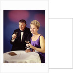 1960s 1970s Couple In Formal Tuxedo And Evening Dress Toasting With Champagne Glasses by Anonymous