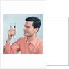 1960s Profile Man Wearing Red Checkered Shirt Holding Glass Of Water by Anonymous