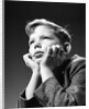1940s Bored Serious Boy Waiting Chin Resting In Hands by Anonymous