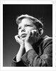 1940s Bored Serious Boy Waiting Chin Resting In Hands by Anonymous