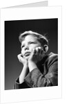 1940s Bored Serious Boy Waiting Chin Resting In Hands by Anonymous