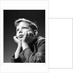 1940s Bored Serious Boy Waiting Chin Resting In Hands by Anonymous