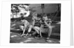 1970s Three Bored Boys Sitting On Curb All Wearing Striped Tee Shirts Shorts And Sneakers by Anonymous