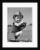 1940s Boy Playing Fireman In Toy Fire Truck Wearing Fireman's Safety Hat Holding Steering Wheel by Anonymous