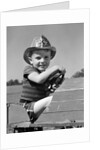 1940s Boy Playing Fireman In Toy Fire Truck Wearing Fireman's Safety Hat Holding Steering Wheel by Anonymous