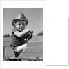 1940s Boy Playing Fireman In Toy Fire Truck Wearing Fireman's Safety Hat Holding Steering Wheel by Anonymous
