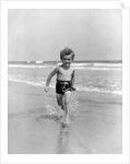 1930s Little Toddler Running In Surf by Anonymous