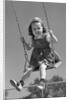 1940s Girl Swinging On Playground Swing by Anonymous