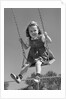 1940s Girl Swinging On Playground Swing by Anonymous