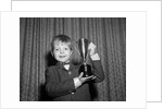 1950s Proud Boy Holding Up Trophy Award by Anonymous