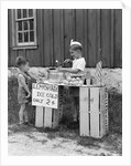 1930s 1940s Boy With Lemonade Stand Selling To Little Boy In Short Pants by Anonymous