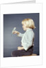 1950s 1960s Girl With Pet Bird Parakeet On Her Finger by Anonymous