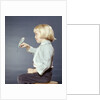 1950s 1960s Girl With Pet Bird Parakeet On Her Finger by Anonymous