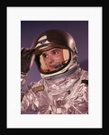 1960s Man Astronaut Lifting Up Visor Helmet Wearing Silver Navy Space Suit by Anonymous