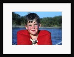 Young Boy Wearing Red Life Preserver by Anonymous