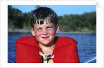 Young Boy Wearing Red Life Preserver by Anonymous