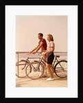 1950s 1960s Teen Couple Standing By Bikes On Beach Boardwalk by Anonymous