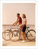 1950s 1960s Teen Couple Standing By Bikes On Beach Boardwalk by Anonymous