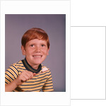 1960s Happy Boy Red Hair Striped Tee Shirt Holding Toothbrush Brushing Teeth by Anonymous