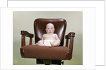 1960s Chubby Bald Baby Wearing Cloth Diaper Sitting In Executive Office Business Chair by Anonymous