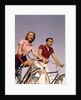 1950s 1960s Couple Man Woman Riding Bicycles Outdoors by Anonymous