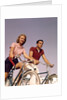 1950s 1960s Couple Man Woman Riding Bicycles Outdoors by Anonymous