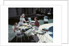 1950s Family In Backyard Having Picnic From Grill Near Swimming Pool by Anonymous