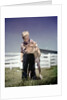 1940s 1950s Little Boy Hugging Pet Calf by Anonymous
